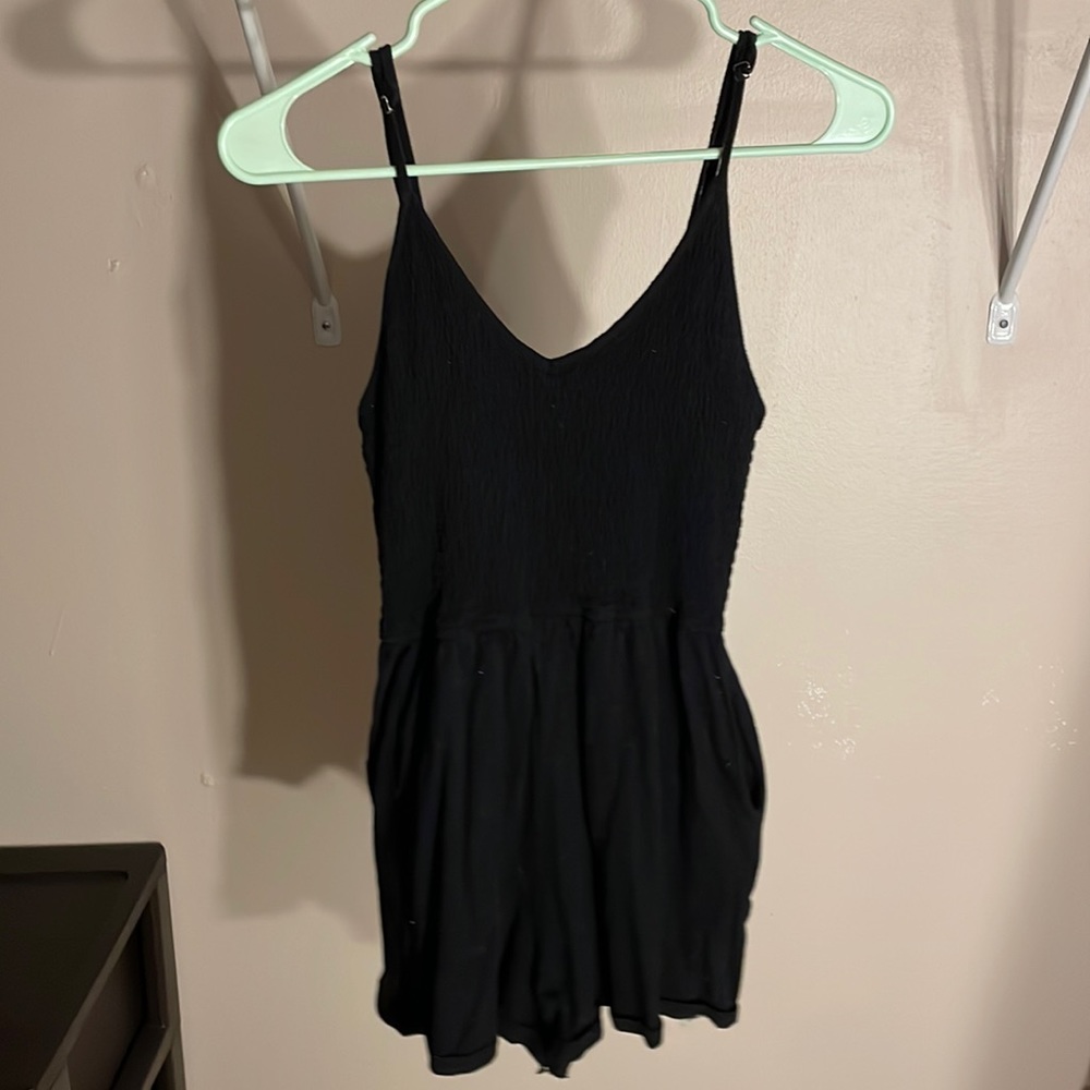 Wild fable black romper with pockets. Size medium.